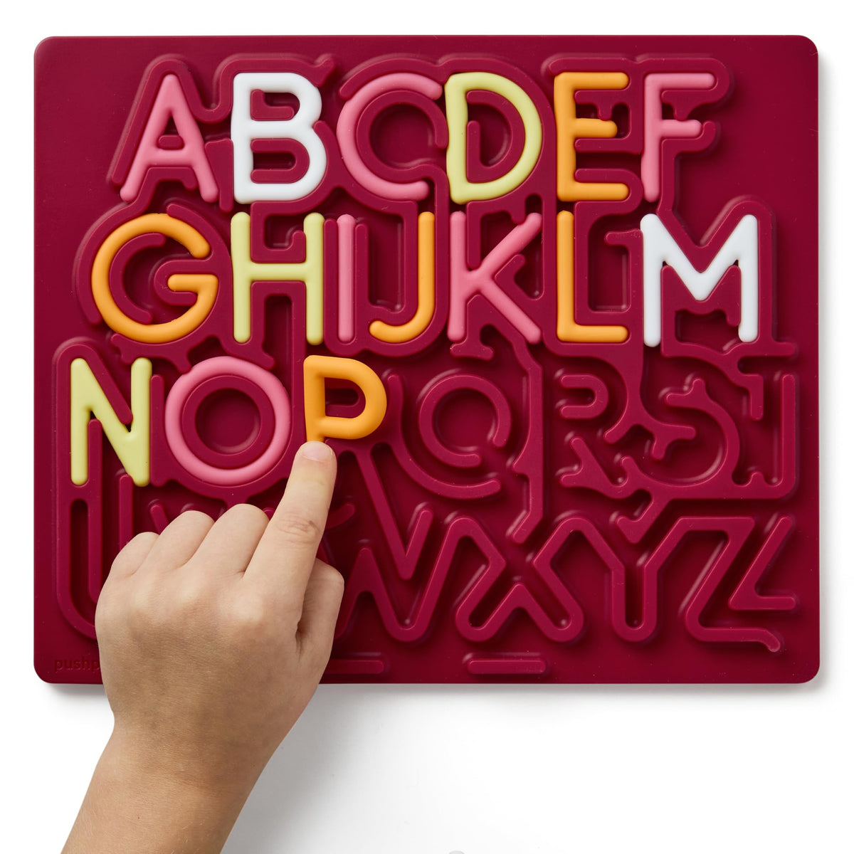 Pushpeel silicone puzzle board in quiet use at home or classroom.
