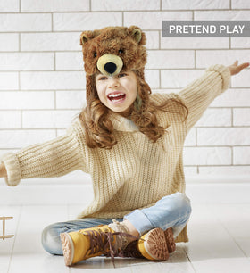 Puzzled Brown Grizzly Bear Hat worn by an adult for warmth
