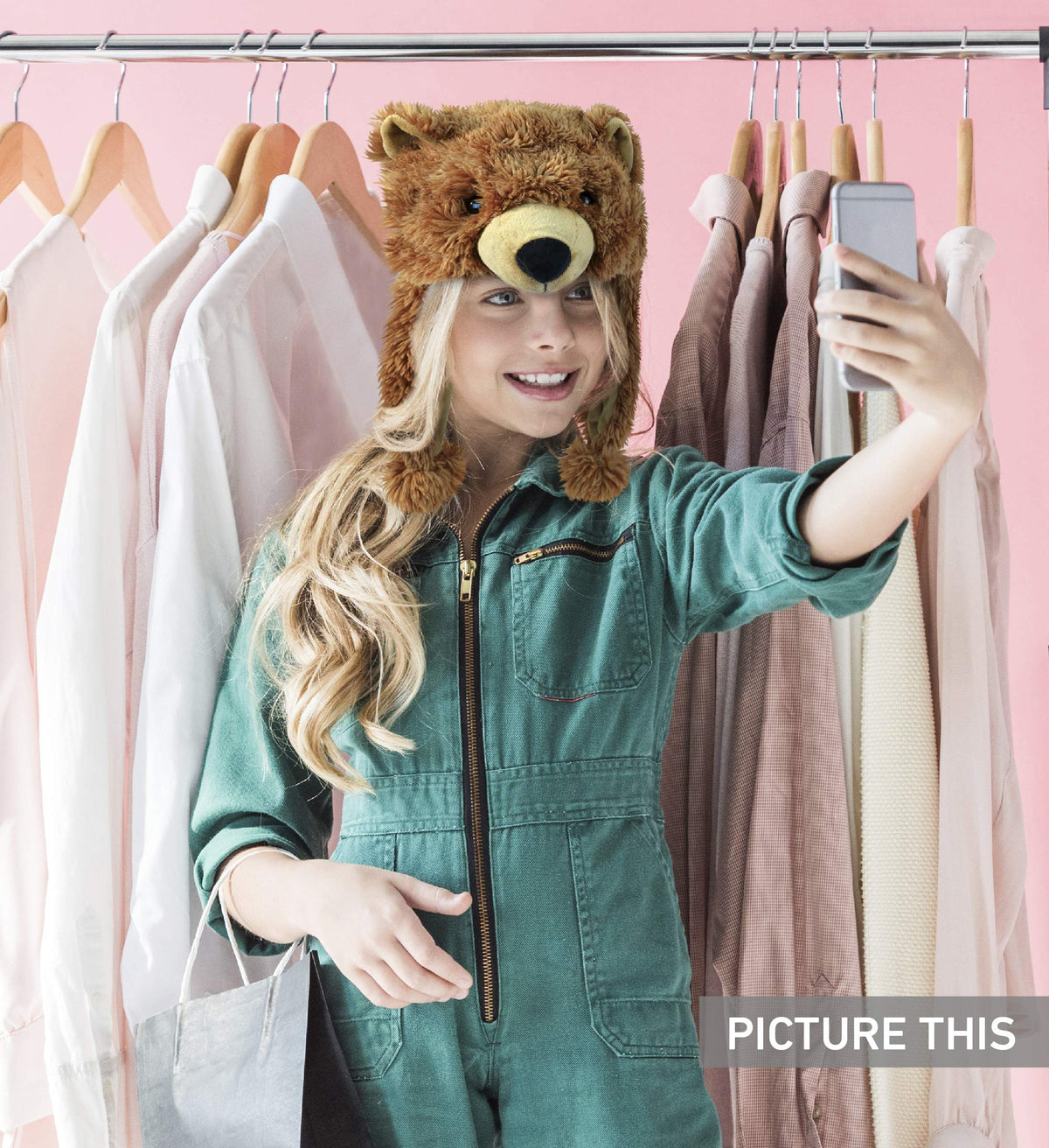 Puzzled Brown Grizzly Bear Hat worn by a child during winter
