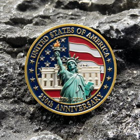 QEXGQS 250th anniversary coin close-up showing fine details and colors.