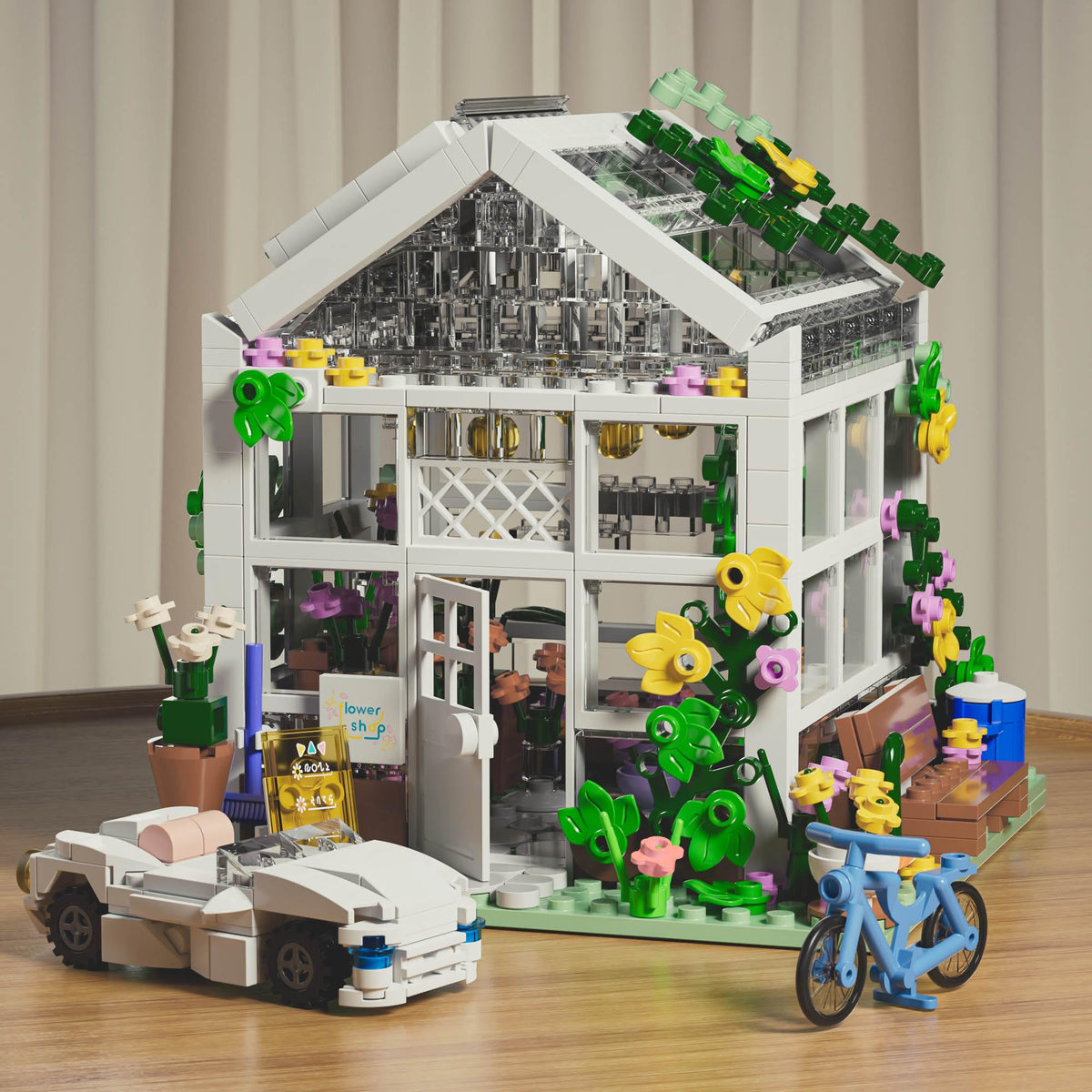 QLT QIAOLETONG greenhouse building toy encourages creative building through realistic details.