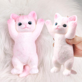 QOUXZ hand-painted cat squishy toy closeup for tactile stress relief.