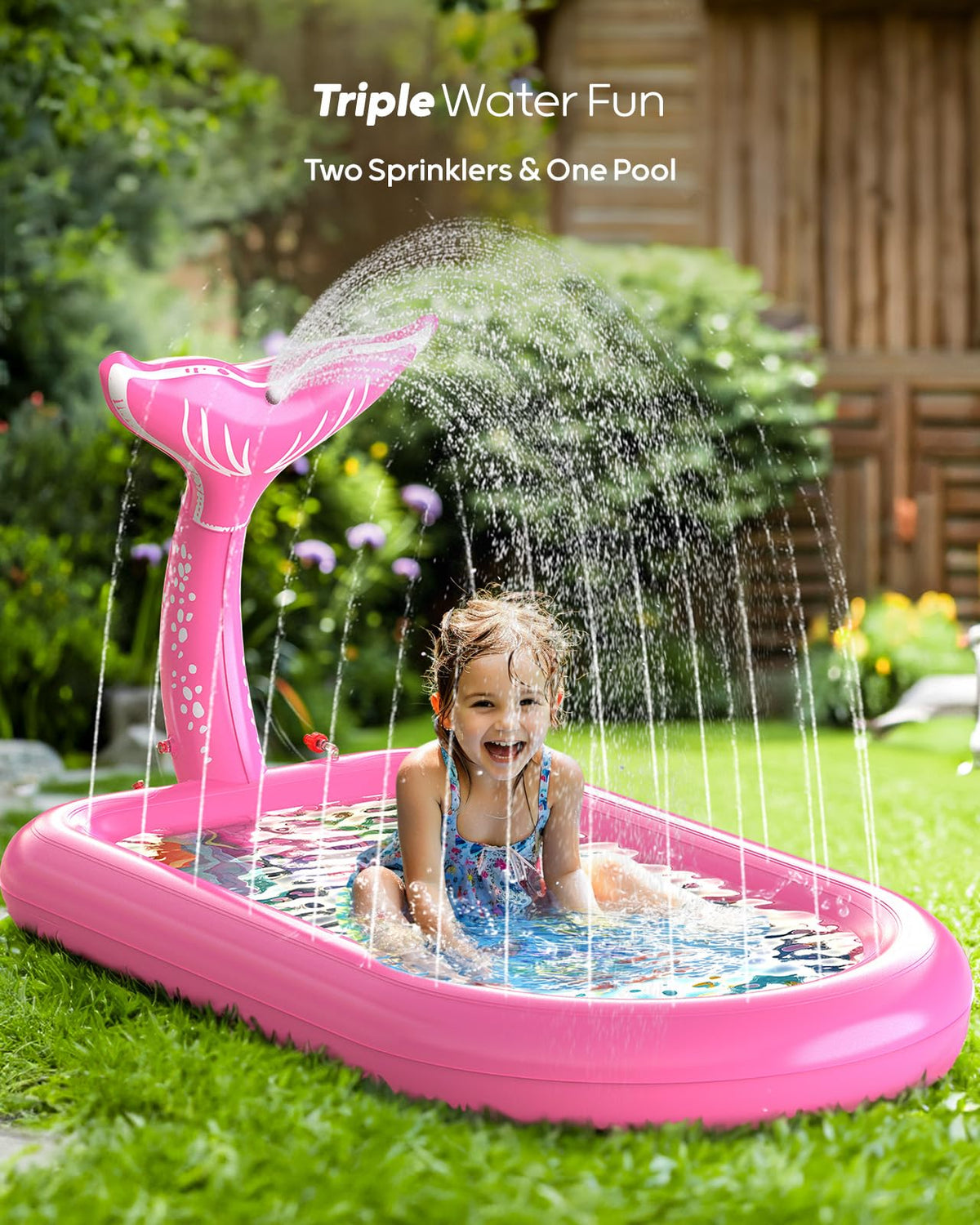 QPAU Mermaid tail sprinkler spraying water across the pool.