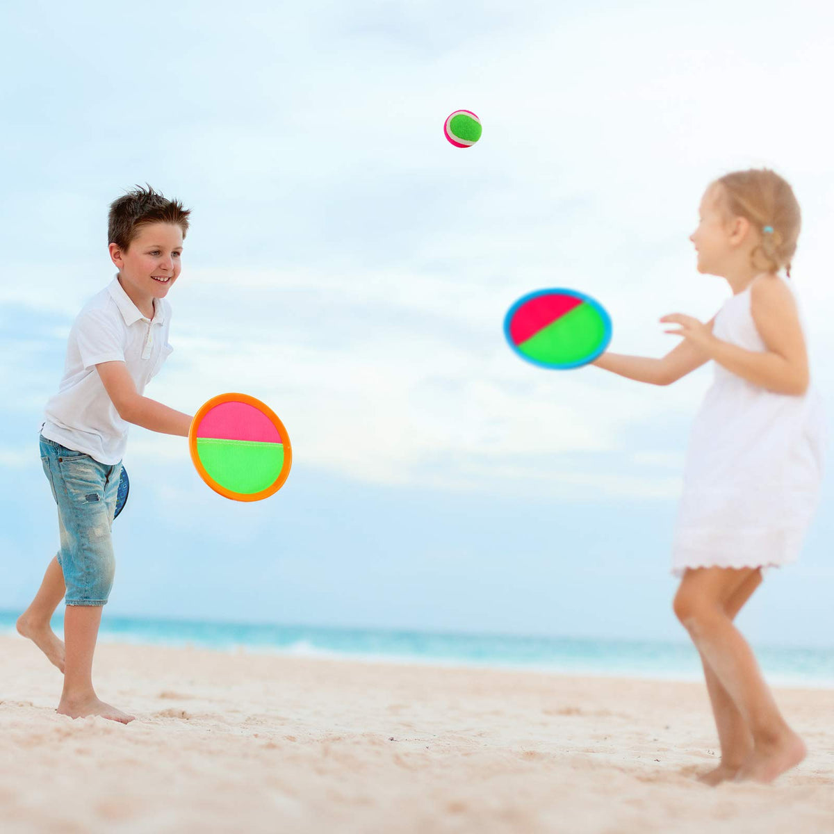 Qrooper toss-and-catch set showing four paddles and balls for family fun
