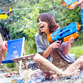 Quanquer outdoor pool play scene with water guns in summer fun.
