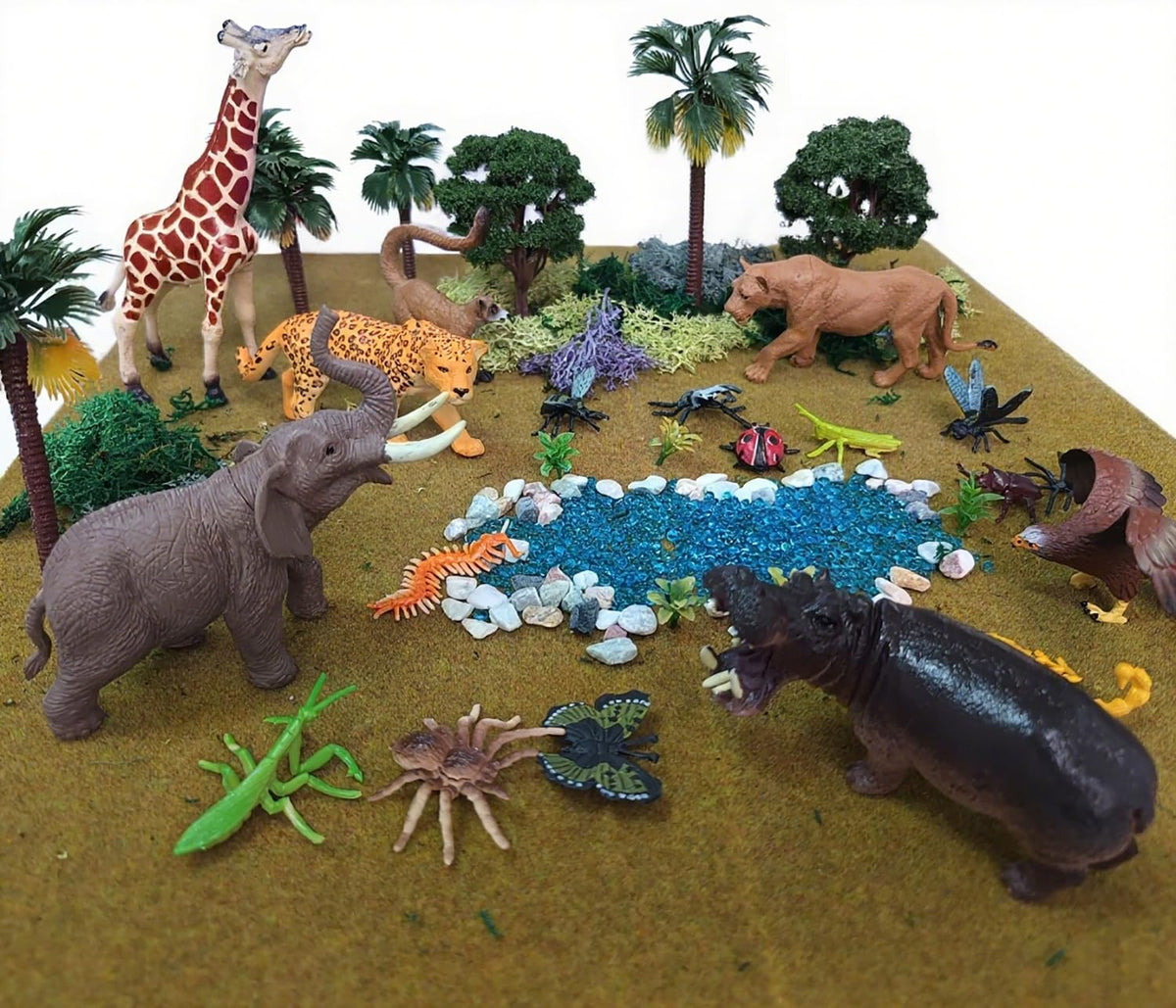 QuarenDen rainforest deer figurine enhances pretend play and classroom displays.