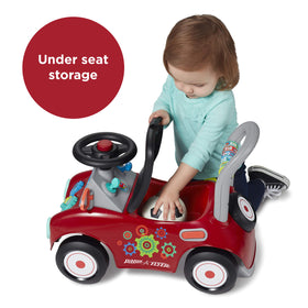 Radio Flyer Busy Buggy under-seat storage keeps favorite toys nearby.