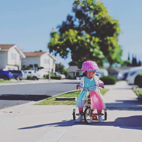 Radio Flyer red tricycle ideal for sidewalks, parks, and family outings