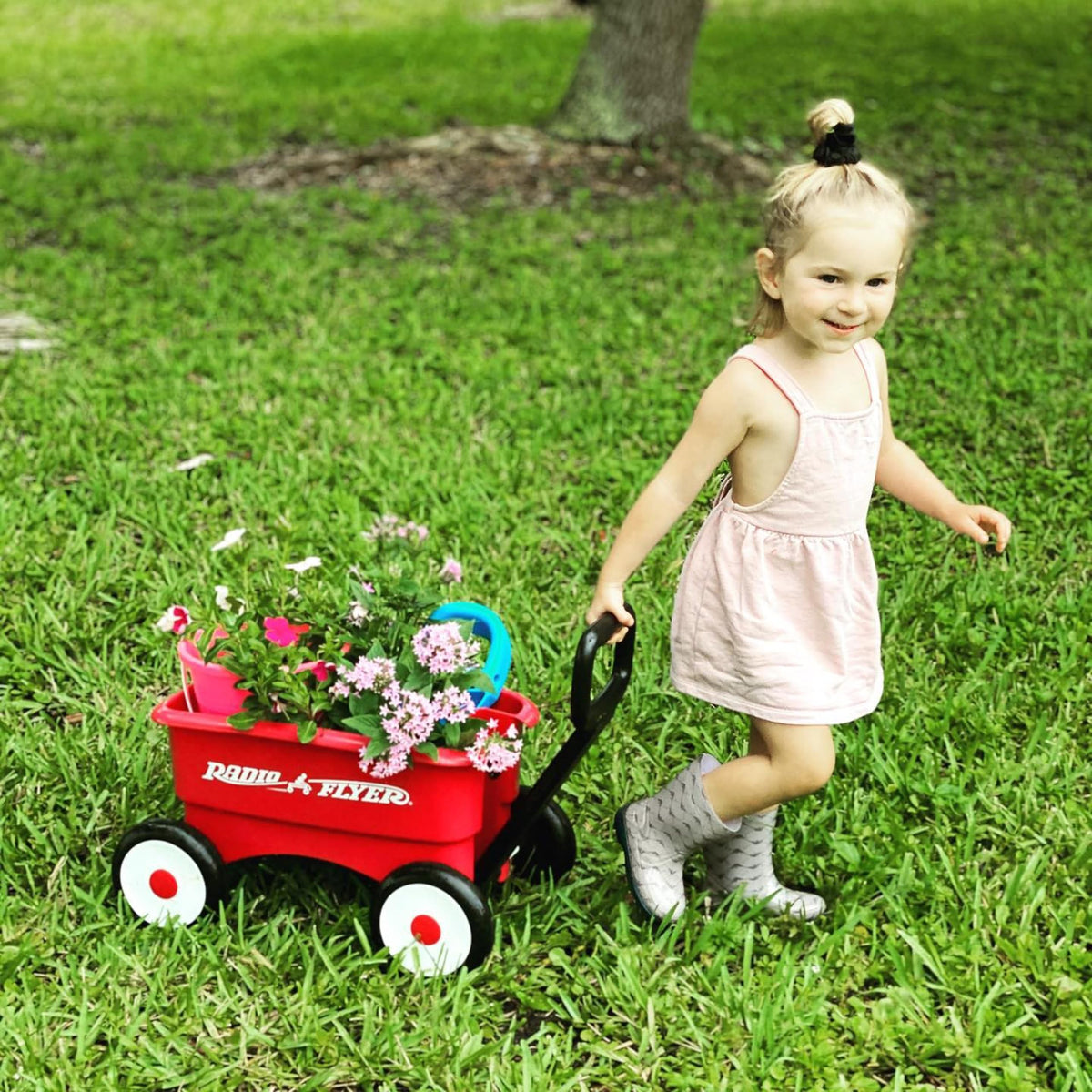 Radio Flyer suitable for indoor and outdoor adventures across sidewalks and lawns.