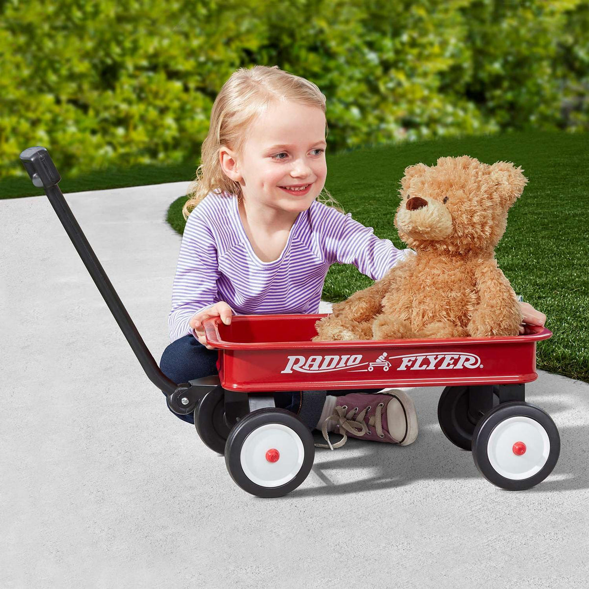 Radio Flyer Mini Classic Red Wagon side view for indoor and outdoor adventures.