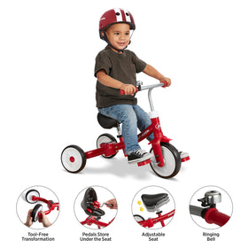 Radio Flyer Triple Play Trike in tricycle mode supports pedaling coordination outdoors