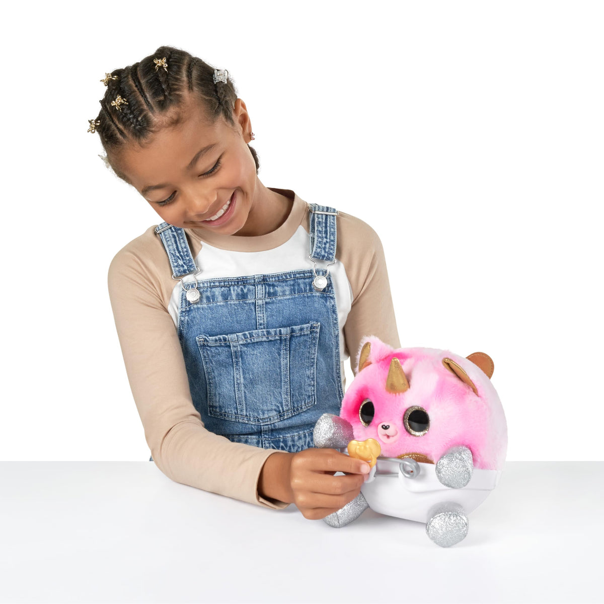 Rainbocorns baby figure offers a cuddly, poseable mini friend.