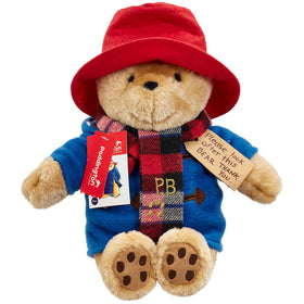 Rainbow Designs Paddington Bear in blue duffle coat and red hat, a cozy bedtime companion.