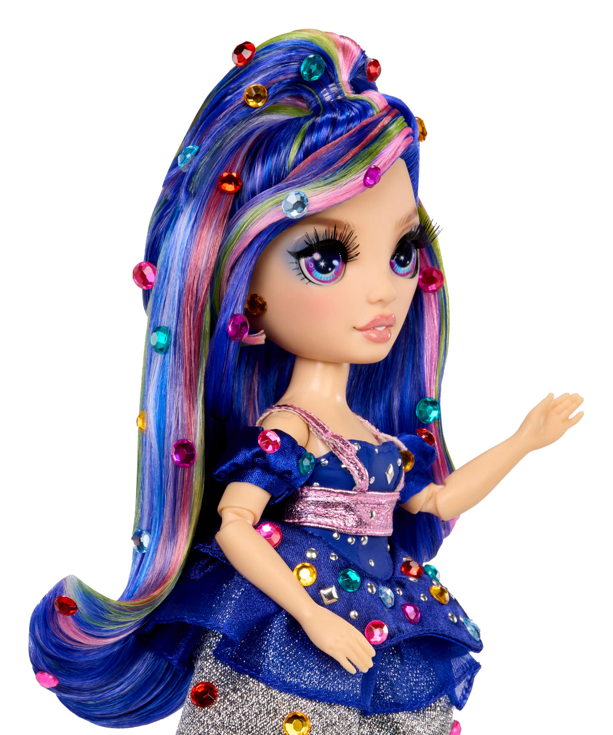 Rainbow High bedazzling tool in action adding gems to clothing