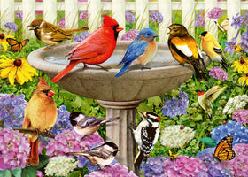 Ravensburger At The Birdbath garden scene with birds, ideal for nature lovers and relaxing puzzle sessions.