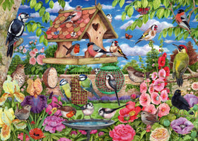 Ravensburger The Bird Table puzzle cover inviting mindful puzzling in a garden setting.