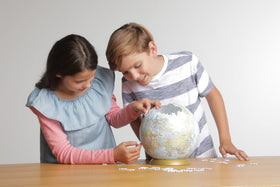 Family-friendly Ravensburger puzzle time fostering collaboration and focus.