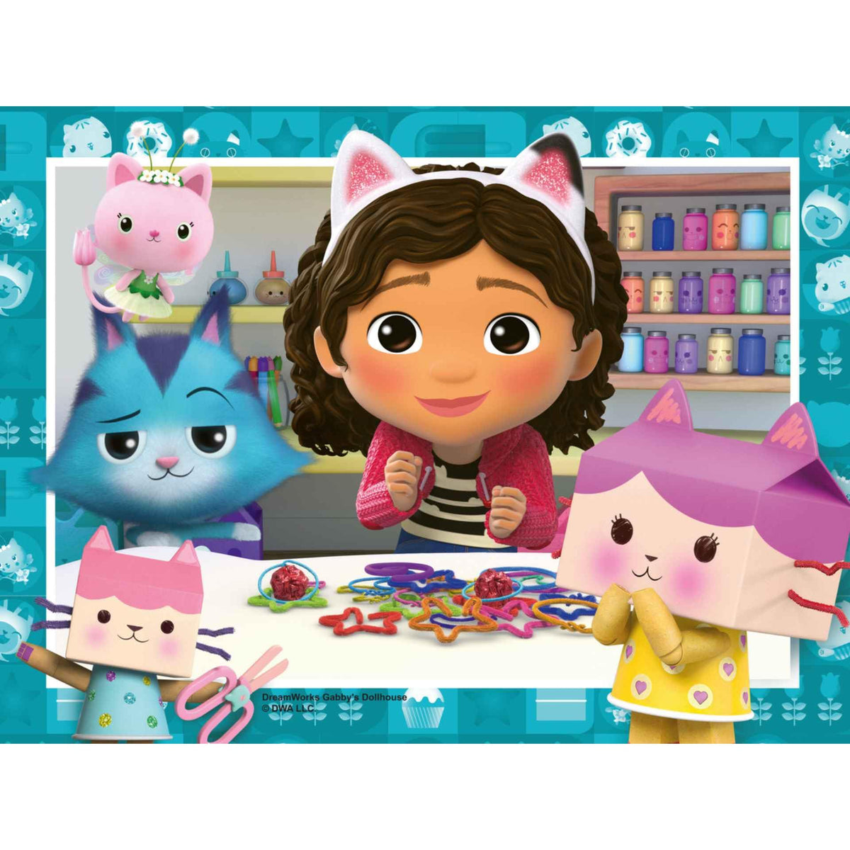 Ravensburger Gabby’s Dollhouse puzzle pieces spread for family puzzle time.