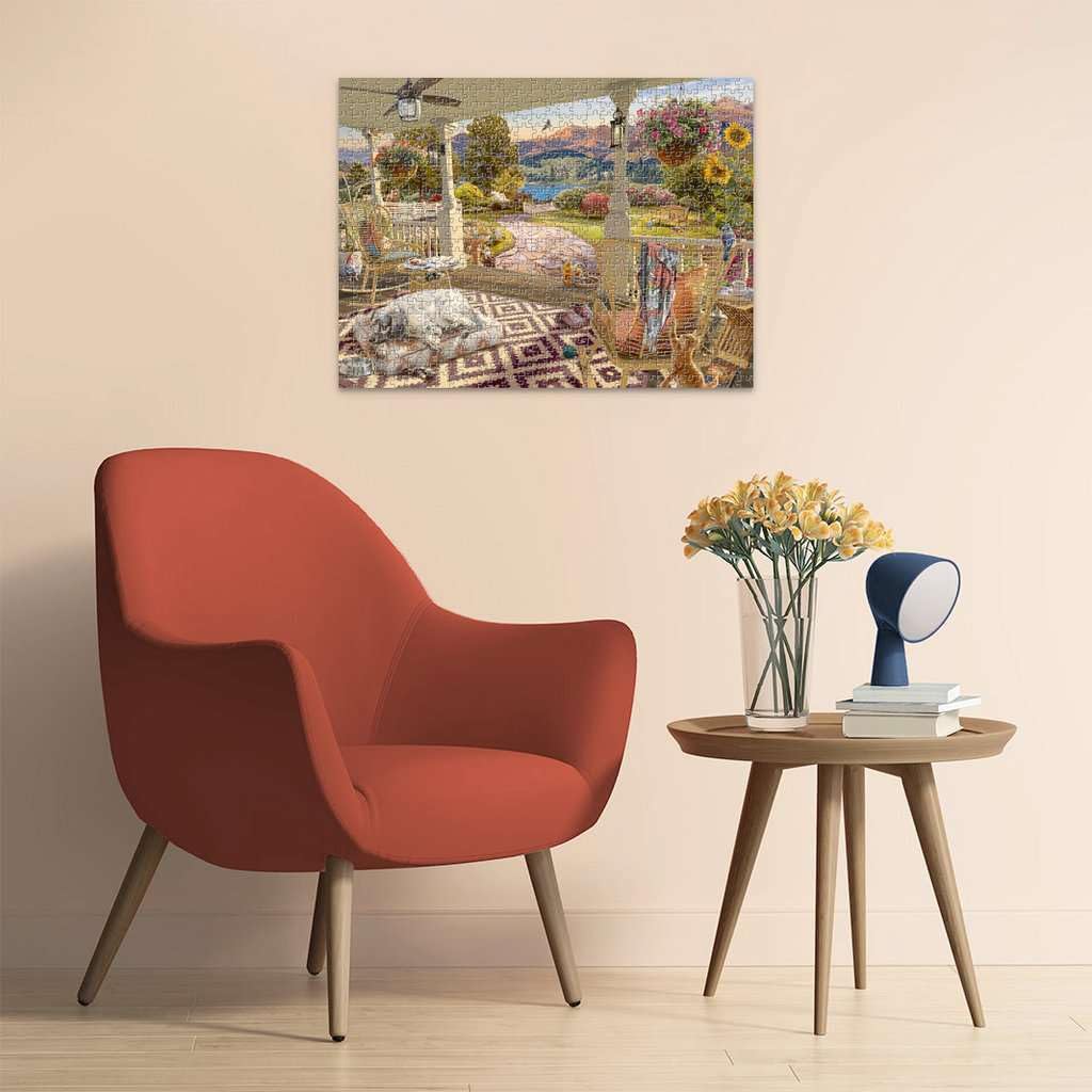 Ravensburger hummingbirds and flowers on the porch—vivid detail inspires evenings of puzzling.