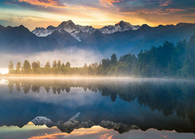 Ravensburger Lake Matheson puzzle shows still-water reflection for calm, focused puzzle time.