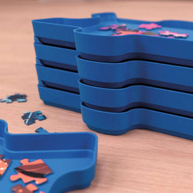 Ravensburger Sort & Go trays for color-based sorting to speed up 300–1000-piece puzzles.