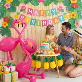 Realspring inflatable flamingo stands tall in an outdoor party setup