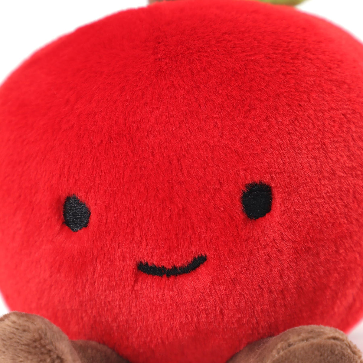 RECUR apple plush serves as a gentle companion for all ages.