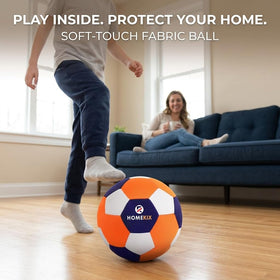 Redfield HomeKix Size 4 ball held by child for gentle indoor practice, safe around furniture.