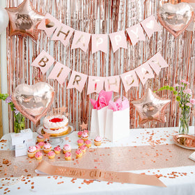 REGAL DECORATIONS pre-strung banner in rose gold enables quick, coordinated decor