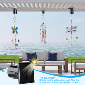 Reginary wind chime spinning in garden with motion and color