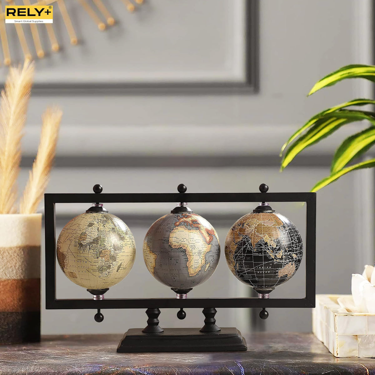 Rely+ sleek black and silver globe suits modern desks.