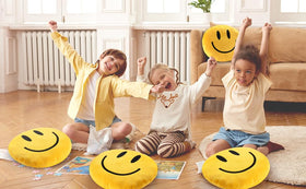 RENAMB Smiley Face Pillow 14-inch round shines on beds or sofas.