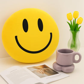 RENAMB Smiley Face Pillow in soft plush fabric for cozy lounging.