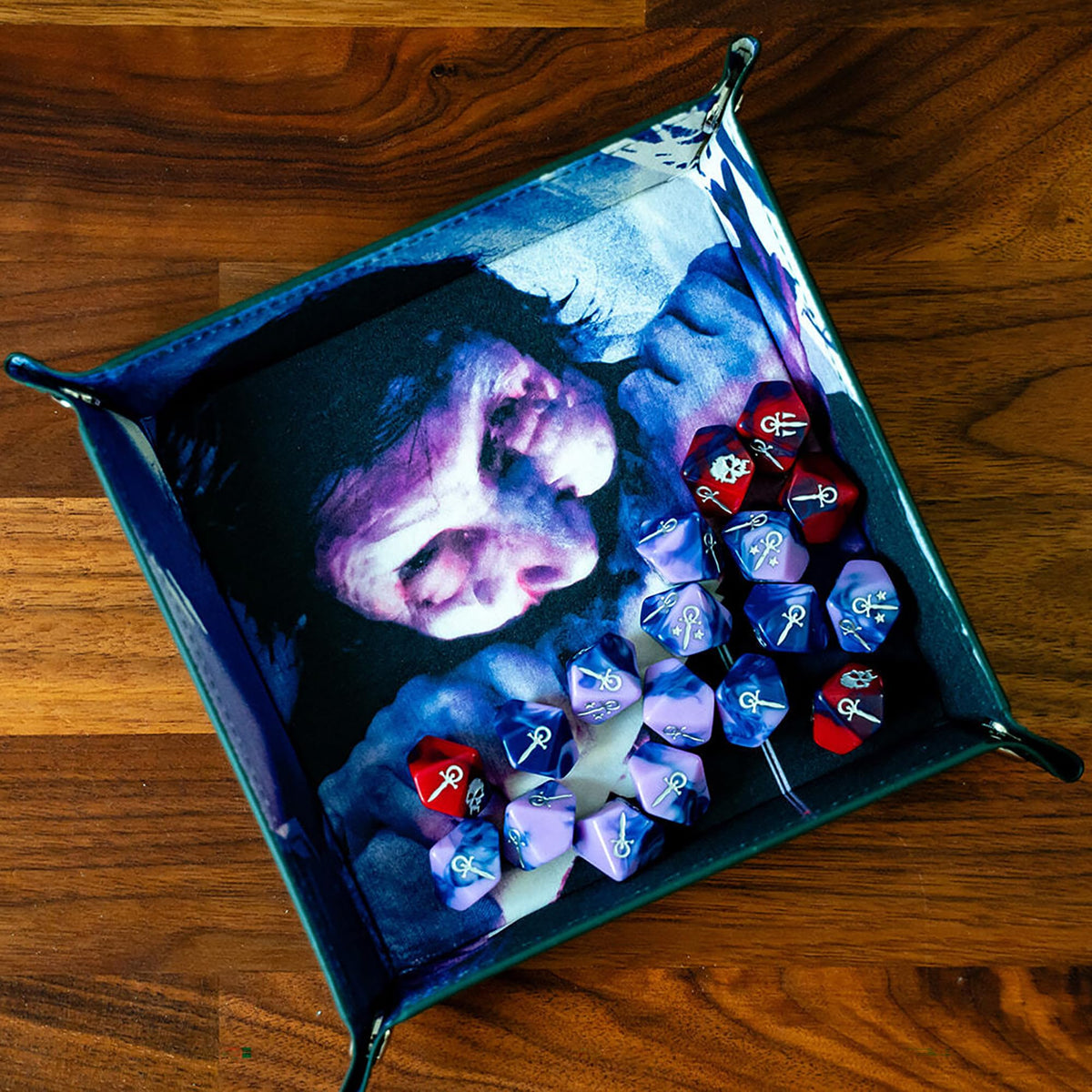 Renegade Acquired Taste hunger dice in bold purple and red enhance thematic cues during play.