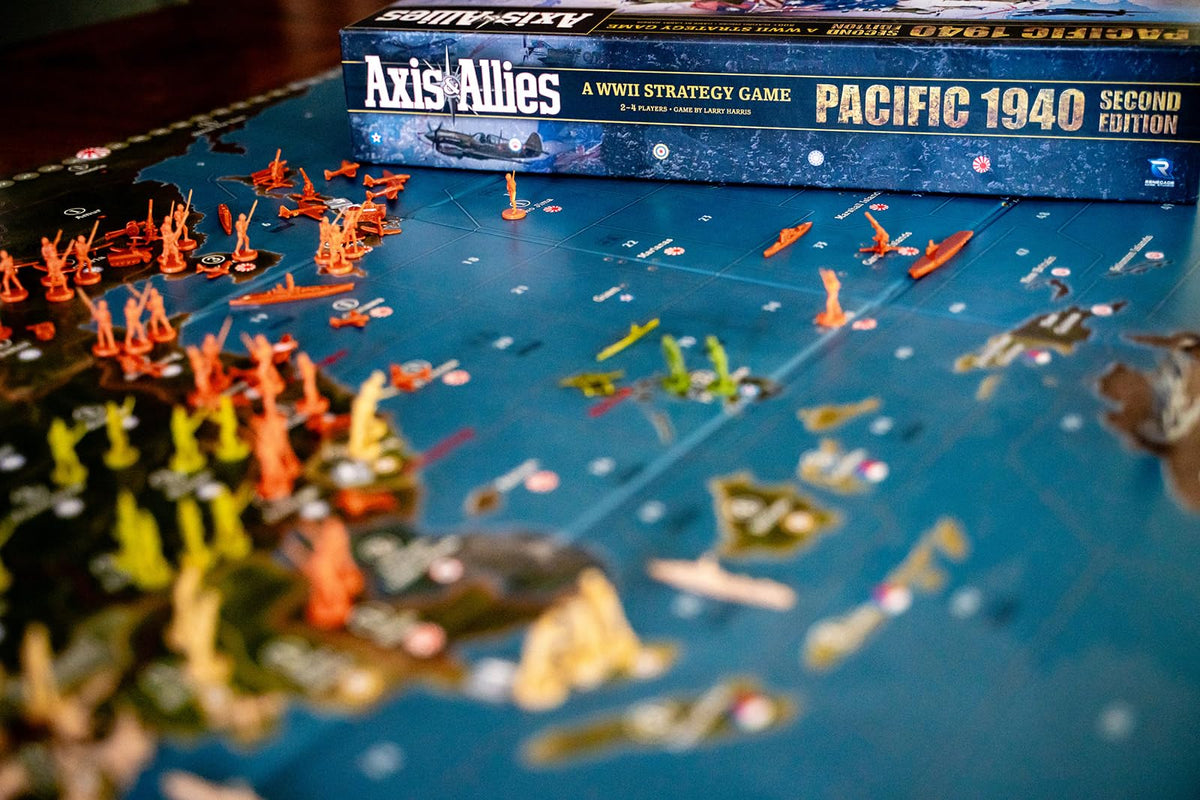 Renegade Game Studios Axis & Allies 1940 Pacific rulebook opened for setup