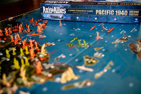 Renegade Game Studios Axis & Allies 1940 Pacific rulebook opened for setup