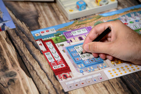 Repos Production 7 Wonders Dice Game wipes for quick cleanup after play sessions