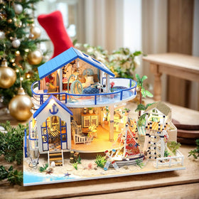 RHZN Miniature Beach House Kit interior detail reveals tiny rooms and vibrant textures.