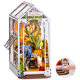Robotime Garden House Booknook with LED light adds warm ambience to shelves.