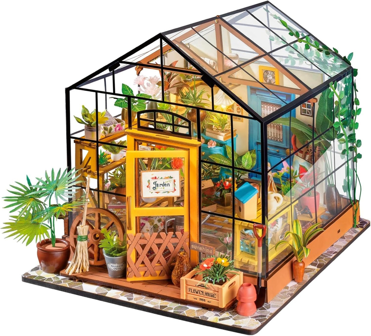 ROBOTIME greenhouse DIY kit with LED light for a glowing night display.