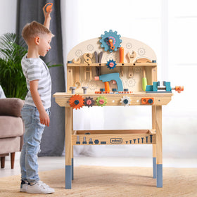 ROBUD kids role-playing at the workbench encourages cooperative play