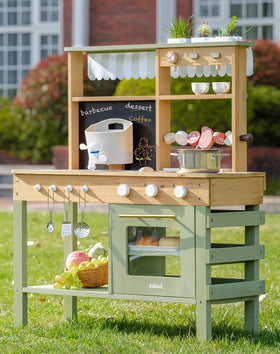 ROBUD Mud Kitchen kids playing outdoors encourages active, social pretend play.