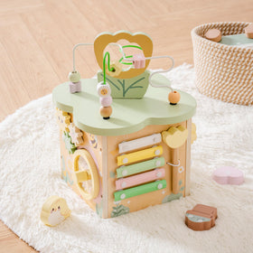 ROBud 7-in-1 play cube demonstrates shape matching and problem-solving for toddlers.