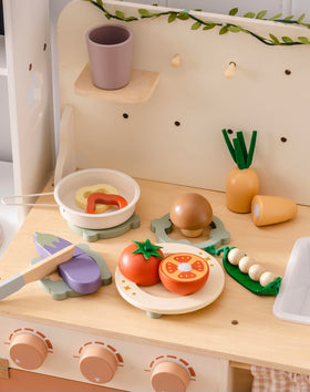 ROBUD wooden knife for safe slicing during pretend cooking.