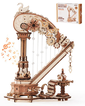 ROKR Magic Harp Music Box kit in assembly with intricate gears for mindful crafting.