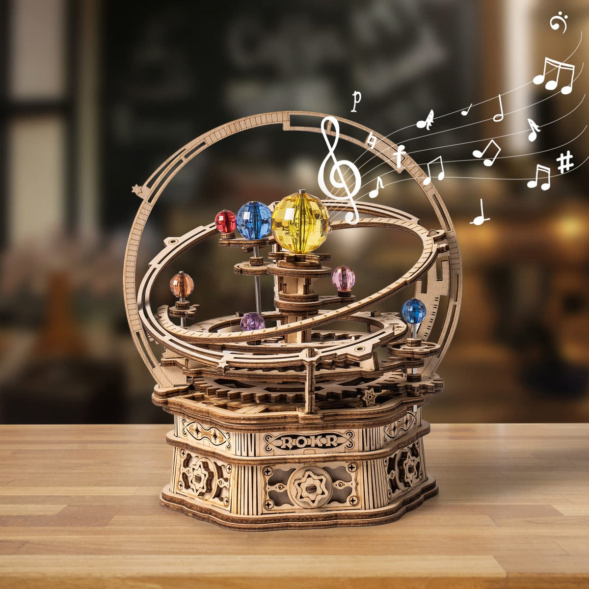 ROKR Starry Night music box kit assembly highlights wooden gears for a mindful, immersive project.