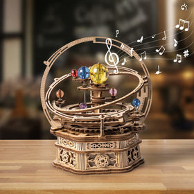 ROKR Starry Night music box kit assembly highlights wooden gears for a mindful, immersive project.