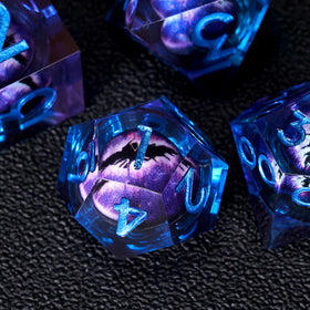Role Dice blue purple resin artwork, dragon eye pattern showcased in natural light.