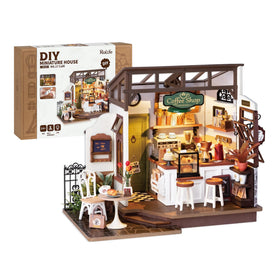 Rolife Coffee Shop Miniature Kit components laid out for easy assembly