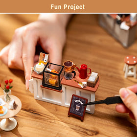 Rolife Coffee Shop Miniature Kit interior with LED lighting for warm ambience